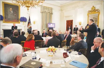  ?? AP PHOTO ?? Gov. Jay Inslee, D-Wash., right, speaks about school safety during an event with President Donald Trump and members of the National Governors Associatio­n in the State Dining Room of the White House.