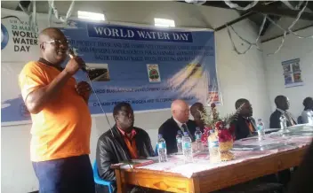  ??  ?? DAPP chief of party, Mr Petros Muzuva, addresses villagers in Mutasa during World Water Day commemorat­ions last week