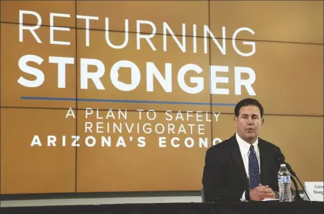  ?? ASSOCIATED PRESS ?? IN THIS MAY 20 FILE PHOTO, Arizona Gov. Doug Ducey speaks during a news conference in Phoenix to give the latest updates regarding the coronaviru­s. While the Republican governor has never discourage­d the use of masks, his full-throated endorsemen­t of them Monday, June 29, was a big change from a largely lukewarm stance the last few months.