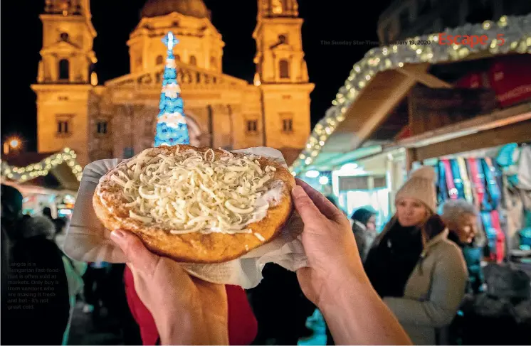  ??  ?? Langos is a Hungarian fast-food that is often sold at markets. Only buy it from vendors who are making it fresh and hot - it’s not great cold.
January 19, 2020
