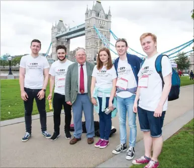  ??  ?? Former Christ Church students George Scuffham, Rory Wheble, Katharine Green, Mike Freeney and Ben Keech with Rebecca’s father, Ilford South MP Mike Gapes for the Heart of London Bridges Walk