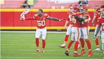  ?? HOFFMANN] ?? Kansas City Chiefs linebacker Willie Gay Jr. (50) and teammates celebrate as the Carolina Panthers miss a game-winning field goal attempt on Sunday in Kansas City, Mo. [AP PHOTO/REED