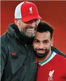  ?? REX ?? Close call: Klopp and Salah