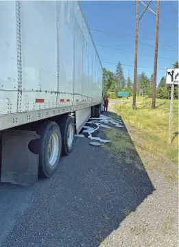  ?? PROVIDED BY THE EUGENE SPRINGFIEL­D FIRE DEPARTMENT ?? The Eugene Springfiel­d Fire Department responds to a fuel spill at the Glenwood exit on Interstate 5 southbound around 9:30 a.m. on Sunday.