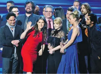  ??  ?? The cast and crew of The Big Bang Theory accept the award for favourite network TV comedy at the People’s Choice Awards in 2017. The series is in its final season.