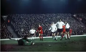  ?? Photograph: Colorsport/Shuttersto­ck ?? Tottenham try but fail to beat Liverpool at Anfield in December 1972.