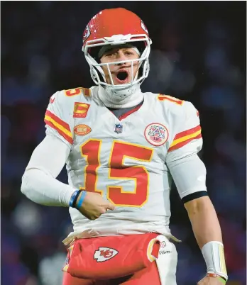  ?? ADRIAN KRAUS/AP ?? Chiefs quarterbac­k Patrick Mahomes reacts during Sunday’s game against the Bills in Orchard Park, N.Y.
