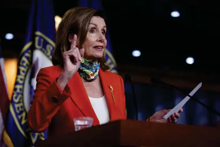 ?? Photograph: Carolyn K aster/ AP ?? House Speaker Nancy Pelosi: ‘The president should bean example. You know, real men wear masks. Bean example to the country and wear them ask .’