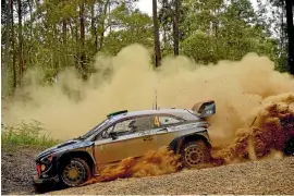  ??  ?? New Zealand driver Hayden Paddon, here in action in Australia last year, will contest seven rounds of the World Rally Championsh­ip in 2018.