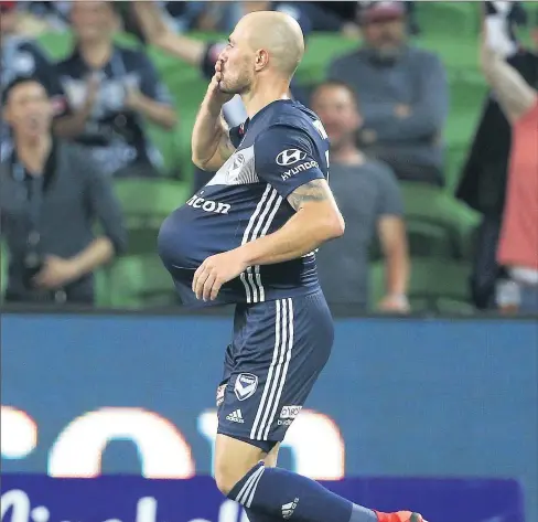  ?? Picture: AAP/Hamish Blair ?? Oh baby: James Troisi celebrates his goal for Victory with the ball up his shirt.