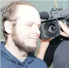  ?? CP ?? Joshua Boyle heads to his meeting with reporters in Toronto Friday night.