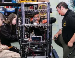  ??  ?? HARD AT work on a robotics project: World ORT students in Dimona.