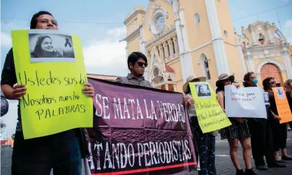  ??  ?? Journalist­s demonstrat­e against the murder of another colleague, María Helena Ferral, in Xalapa, Veracruz state, in April. Photograph: Hector Quintanar/AFP via Getty Images