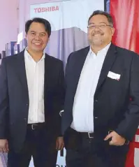  ??  ?? Toshiba marketing and business developmen­t head Joeben Gamatero and business unit head Joey Hidalgo.