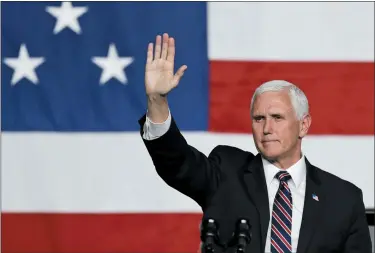  ?? TONY DEJAK — ASSOCIATED PRESS ?? Vice President Mike Pence waves to supporters after speaking at the launch of the electric Endurance pickup truck at Lordstown Motors Corporatio­n June 25 in Lordstown.