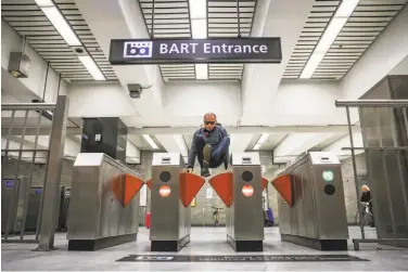  ?? Gabrielle Lurie / The Chronicle 2018 ?? Stopping fare cheats, such as this one at Civic Center Station, will require a major investment from BART.