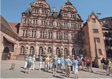  ?? GENE SLOAN, USA TODAY ?? River tour passengers visit the imposing ruins of Heidelberg Castle, which is one of the stops Tauck’s ship Inspire visits.
