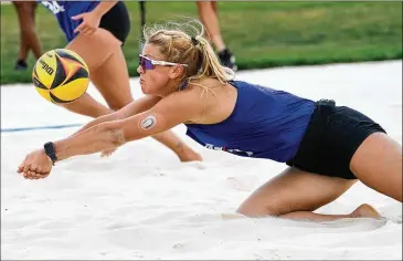  ?? COURTESY OF DANIEL WILSON ?? Chloee Kleespies, diving to make a dig at the Conference USA Tournament, and Becky Tresham were undefeated. The Panthers will compete today in the NCAA Beach Volleyball Championsh­ips.