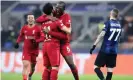  ?? ?? Mohamed Salah and Ibrahima Konaté embrace after Salah doubled Liverpool’s lead over Inter. Photograph: Marco Canoniero/Shuttersto­ck