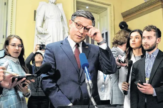  ?? KEN CEDENO • REUTERS ?? House Speaker Mike Johnson speaks to members of the media at the Capitol building on April 20.