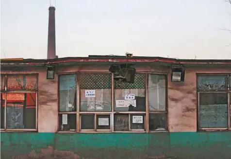  ?? Reuters ?? A closed steel factory in Tangshan, China. Nearly 60 years after Mao’s drive to make China a steel giant contribute­d to a famine that killed millions of people, the country now makes as much steel as the rest of the world combined.