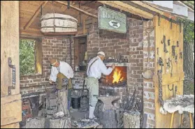  ?? CONTRIBUTE­D BY THE LIVING HISTORY PARK ?? The Living History Park in North Augusta, S.C., contains a working blacksmith’s shop.