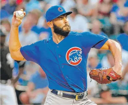  ??  ?? Jake Arrieta retired the first 13 White Sox he faced Wednesday. He allowed two hits and two walks in 6⅔ innings. | JON DURR/ GETTY IMAGES