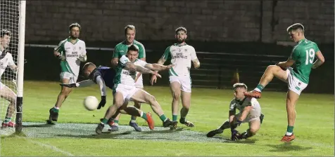  ??  ?? Conor McDonald firing his late goal chance to the left and wide during Friday’s re-fixture in Bellefield.