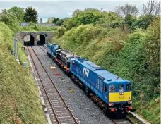  ?? RICHARD WALL ?? On May 5, NIR 111 Class No. 8112 Northern Counties hauled RPSI-owned and former IE Class 141 No. B141 and GNR V Class 4-4-0 compound No. 85 Merlin from Connolly shed to Inchicore Works for the 175 anniversar­y celebratio­n (see also Headline News page 9). It is seen passing the Twin Arches near Glasnevin.