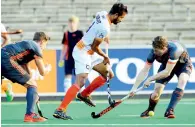  ?? PTI ?? India’s Gurjant Singh dribbles past Dutch players during their match in Amsterdam on Tuesday. —