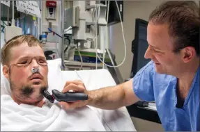  ?? ERIC M. SHEAHAN/ MAYO CLINIC VIA AP ?? In this July 3, 2016, photo provided by the Mayo Clinic, Dr. Samir Mardini shaves the face of his patient, Andy Sandness, days after leading a team that performed the first face transplant surgery at the hospital. Over the years, the two say they've...