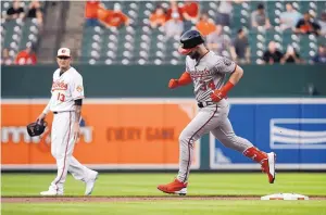  ?? PATRICK SEMANSKY/ASSOCIATED PRESS ?? Washington’s Bryce Harper (34) rounds the bases after hitting a home run in the first inning of the Nationals’ win over Baltimore Tuesday.