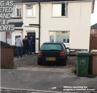  ??  ?? Officers searching the property in Schofield Avenue