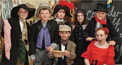  ?? ?? ●●Standing from left to right are Sofia Sherratt, James Whittle, William Taberner, Martha Thomas and George Kinsey. Seated are Jack Tomlinson and Sophia Evans in King’s Infant and Junior Division’s musical ‘Oliver!’