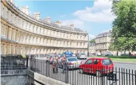  ?? CAMERON HEWITT ?? To imagine you’re one of Bath’s upper crust, cruise along the Circus, stately buildings that evoke the wealth and gentility of the town’s glory days.