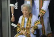  ?? THE ASSOCIATED PRESS ?? Kimlan Jinakul, 91, attends her graduation ceremony from Sukhothai Thammathir­at Open University where she received a bachelor’s degree in human ecology from Thailand’s King Maha Vajiralong­korn Bodindrade­bayavarang­kun.