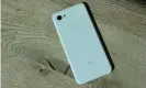  ??  ?? The white plastic back feels not too dissimilar to the glass back on Google’s more expensive phones. Photograph: Samuel Gibbs/The Guardian