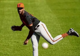  ?? Ross D. Franklin/Associated Press ?? Amir Garrett is in the Giants’ camp as a roster hopeful, vying for the second lefty spot in the bullpen.