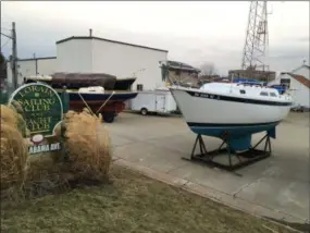  ?? RICHARD PAYERCHIN — THE MORNING JOURNAL ?? Boats sit out of the water Feb. 14 at the Lorain Sailing &amp; Yacht Club. The Lorain Sailing &amp; Yacht Club and the Westlake Yachting Club are considerin­g a merger that would join Lorain’s yacht clubs for the 2019 boating season.