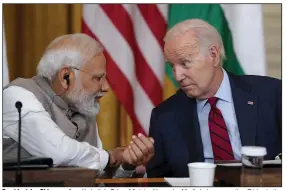  ?? (AP/Evan Vucci) ?? President Joe Biden speaks with India’s Prime Minister Narendra Modi during a meeting Friday in the East Room of the White House in Washington. Video at arkansason­line.com/624moditec­h/.