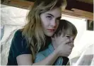  ??  ?? Emilia Jones (left, with Jackson Robert Scott) does impressive work as a teen finding her strength in the family’s eerie new home in “Locke & Key.”