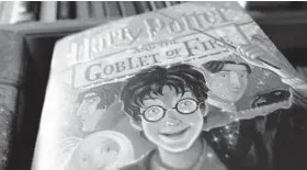  ?? JUSTIN SULLIVAN/GETTY 2004 ?? One of the Harry Potter books is on display at a Clean Well-Lighted Place For Books, a bookstore in San Francisco. The independen­t store closed in 2006.