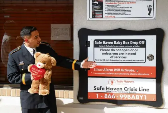  ?? LEVI HILL/HOBBS NEWS-SUN VIA AP ?? Hobbs Fire Chief Mark Doporto showed off the Safe Haven Baby Box at Hobbs Fire State 1 during a news conference on Sept. 25, 2023. The box was the second to be installed in New Mexico.