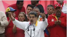  ?? Bild: Ariana Cubillos ?? Demonisera­d? President Nicolas Maduro.
