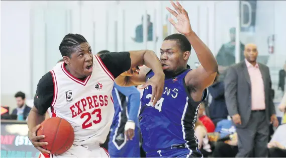  ?? NICK BRANCACCIO ?? Shaquille Keith of the Windsor Express, left, fends off Kitchener-Waterloo Titans defender Tyrone Dickson during Game 2 action in their Central Division semifinal on Sunday. Keith had 11 points as the Express won 132-128 in overtime to take a 2-0 lead...