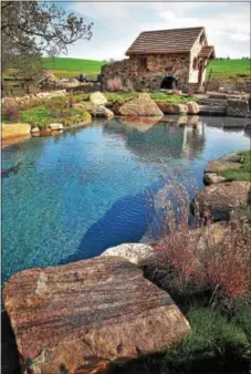  ?? SUBMITTED PHOTO ?? A Unionville farm hosts a swimming pool, or what looks more like a pond.