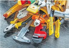  ??  ?? A tool kit equipped with some carefully chosen essentials can help you make common repairs — and save some money in the process.