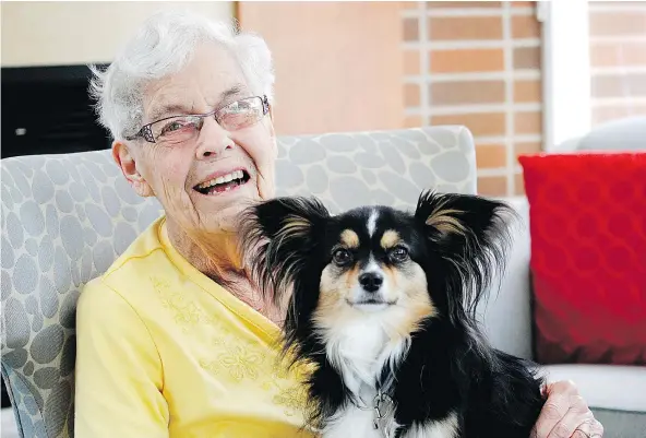  ?? — POSTMEDIA NEWS FILES ?? Evelyn Lockie, 88, and Tina are inseparabl­e. Tina is Evelyn’s service dog, trained to give her emotional support. Evelyn lives with dementia and the pair live together at Henley House in St. Catharines, Ont. Ottawa academic Stuart Chambers says people...