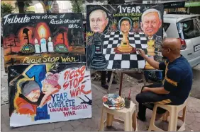  ?? ?? A teacher of Gurukul school of art makes a painting on “One year Ukraine-russia war”, in Mumbai on 23 February. ANI