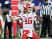  ??  ?? Clemson quarterbac­k Trevor Lawrence (16) looks for a receiver during the first half of the 2020 Atlantic Coast Conference championsh­ip game against Notre Dame in Charlotte, N.C.